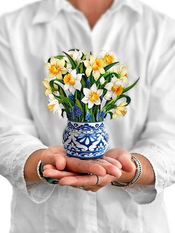Model holds Mini daffodil greeting card