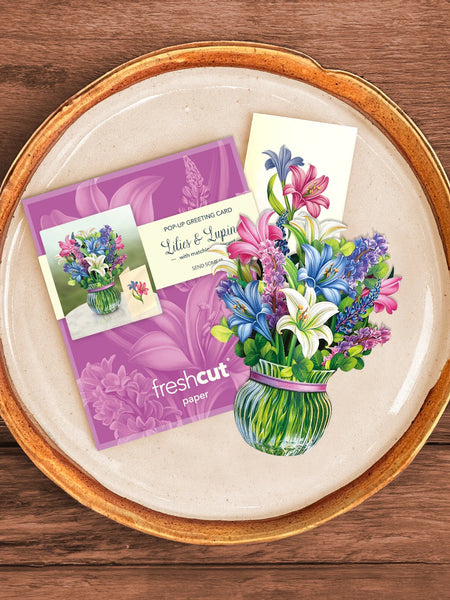 Mini Lilies & Lupines greeting card, notecard and envelope together on a plate