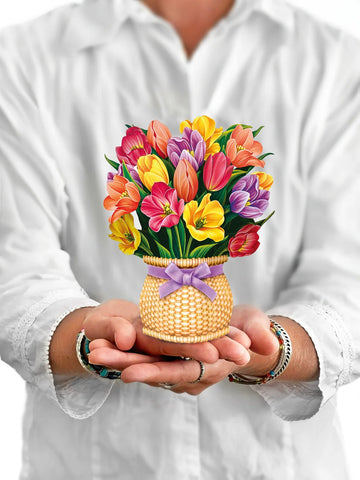 Model holding Mini Festive Tulips greeting card