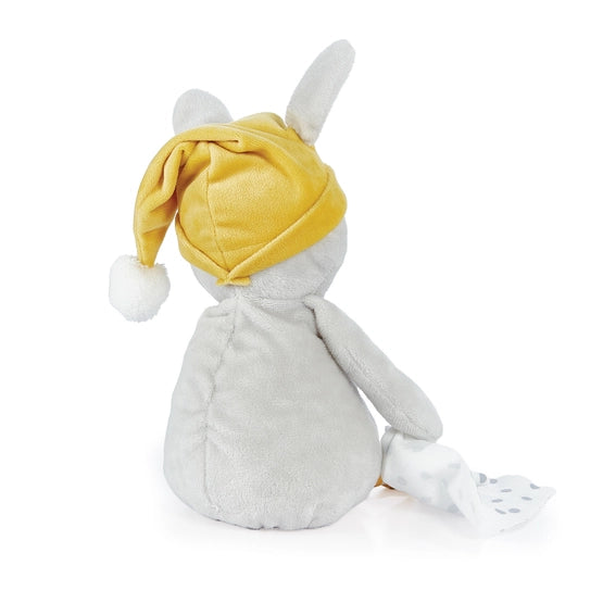 Back side view of plush bunny with yellow hat