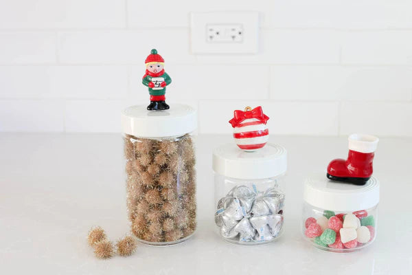 Christmas minis sit atop canisters