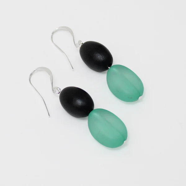 side view of Teal and black beaded earrings by Sylca Designs