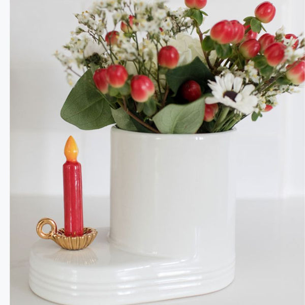 Nora Fleming Mini #420 Light the Way red candle in gold candleholder in the Pinstripes Round Cutie Container