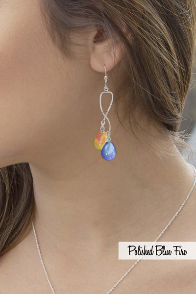 model wears double drop spiral earrings, crystal and sterling silver