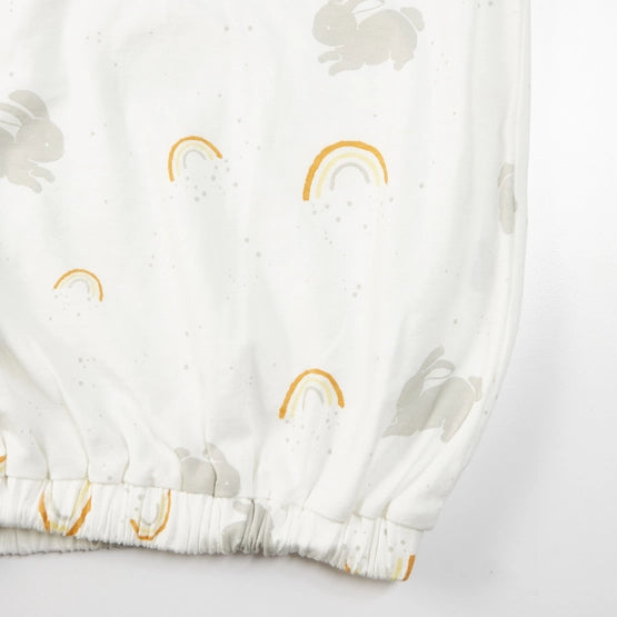 Close view of Little Sunshine baby gown showing elastic gathering