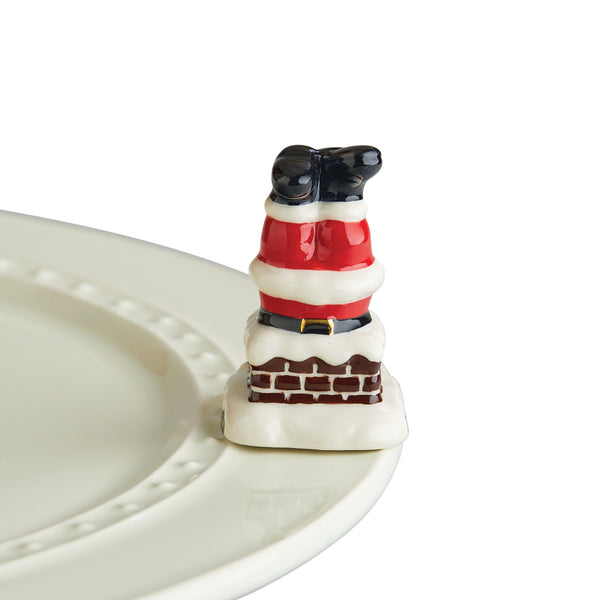 Santa's legs peek out of a chimney top. Hurry Down Santa Mini by Nora Fleming