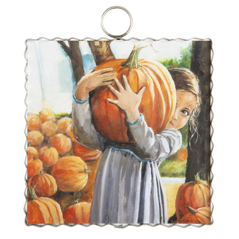 Artist Roxanne Spradlin's depiction of a young girl carrying a huge pumpkin from the garden