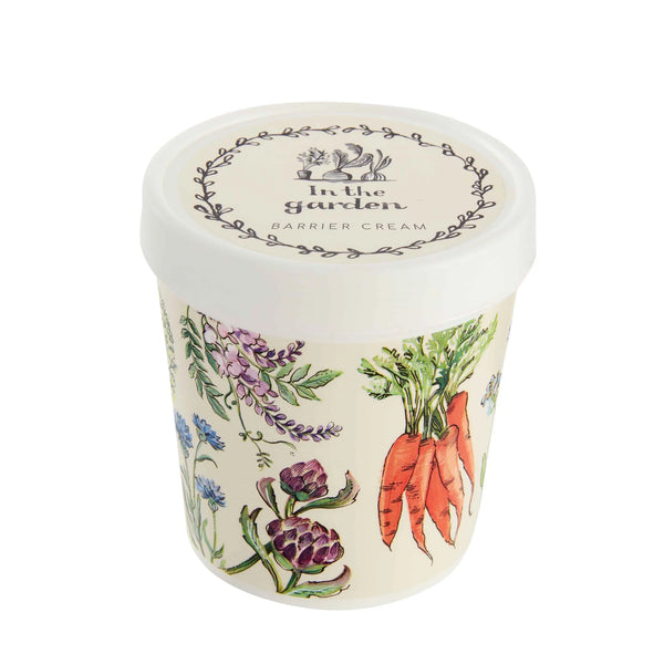 In the Garden Barrier Cream tub with design showing carrots and flowers