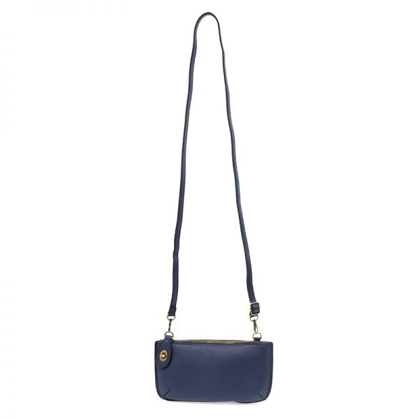 View of the Joy Susan Mini Clutch Crossbody Wristlet with full strap so you can see the length. This is in Cobalt Blue color